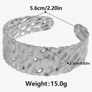 Silver wide cuff bracelet detail with hammered texture and 2.1cm width measurements