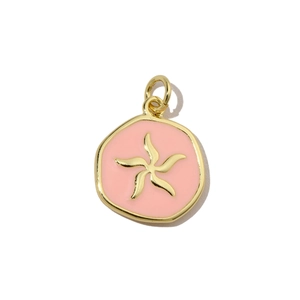 Close-up of a pink enamel gold cross pendant with star pattern for DIY jewelry
