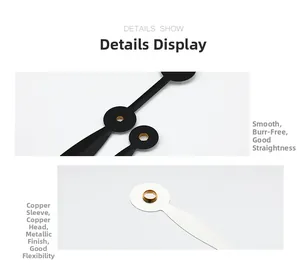 Detailed macro view of metal clock hands with smooth edges and copper sleeve bushings