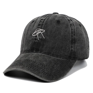 Vintage washed charcoal baseball cap featuring white UFO embroidery and a curved brim