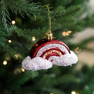 Burgundy Christmas rainbow ornament with white glitter clouds hanging on a tree