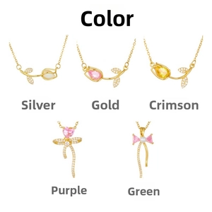 Detailed grid of tulip and bow pendants with crystal stones in polished gold finish