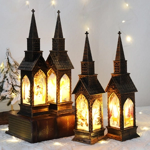 Set di 4 lanterne natalizie a forma di chiesa in bronzo con silhouette di pupazzo di neve
