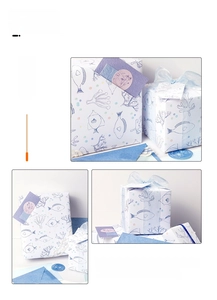Marine life gift wrap kit with blue fish paper, ribbon, cards, and stickers set