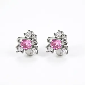 Silver planetary huggie earrings with pink round stone and white zircon accents