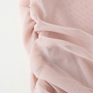 Pink mesh one shoulder top with elegant ruffles and breathable textured fabric detail