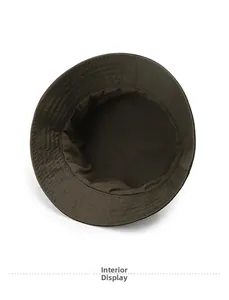 Detailed interior display of dark brown cotton bucket hat with reinforced stitching