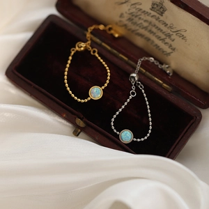 Adjustable titanium steel bead rings with fire opal inlay in gold and silver finish