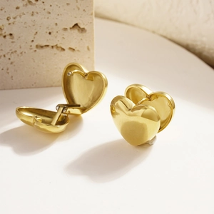 Polished gold double-sided heart huggie earrings made of premium stainless steel
