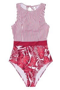 Detailed flat lay of a one-piece swimsuit featuring red stripes and tropical leaf prints