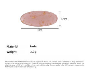 Pink oval resin hair clip with gold foil flakes detailing size 4cm x 1.7cm
