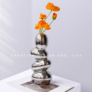 Modern chrome silver pebble vase with creative stacked design for dried flowers