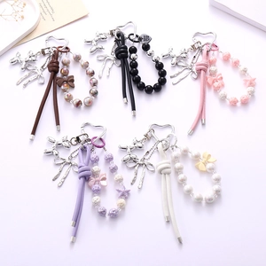 Chic acrylic beaded phone charms with PU leather bows and metallic balloon dog pendants