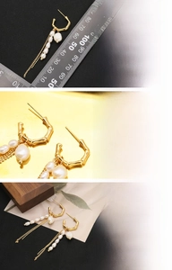Detailed view of 18K gold plated bamboo earrings with natural freshwater pearls and long tassels