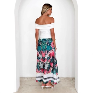 Women's summer set with off-shoulder white top and bohemian floral maxi skirt back view