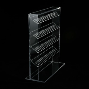 Clear acrylic 4-tier display stand with slotted tiers for jewelry and small items
