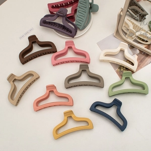 Large matte cream shark hair claws in multiple colors for women with strong grip