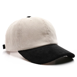 Corduroy baseball cap in contrast black and white with minimalist curved brim design
