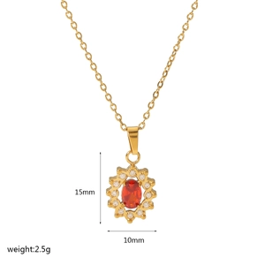 Macro view of 18K gold plated sunflower pendant with ruby center and size labels