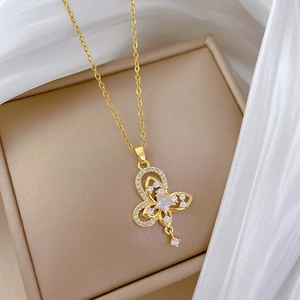 Elegant gold double-layered butterfly pendant necklace with rhinestones on silk