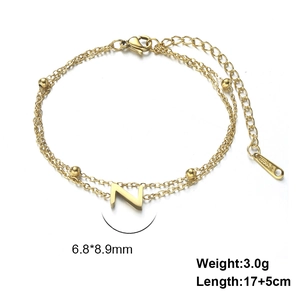 Detail view of a gold-plated double-layer bracelet with letter N pendant and dimensions