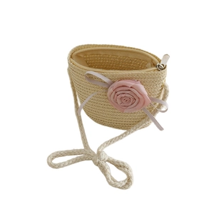 Kids straw crossbody bag in beige with pink rose floral decor and zipper closure