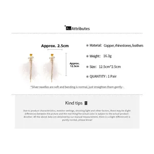 Detail of elegant rhinestone bow earrings with long white feathers and silver needles