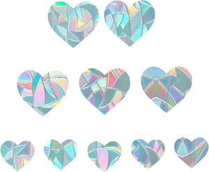 Macro shot of 10 heart-shaped rainbow prism stickers with holographic broken glass effect