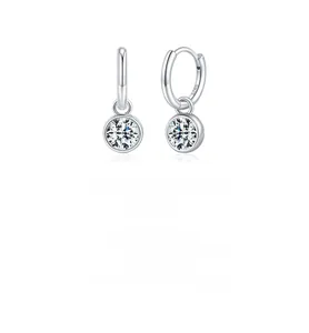 Detailed close-up of S925 sterling silver hoop earrings with a round moissanite pendant