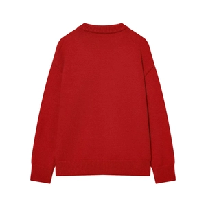 Detailed back view of red knit sweater featuring ribbed collar, cuffs and relaxed fit