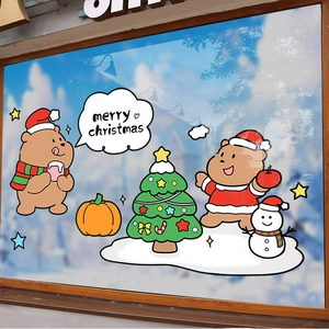 Christmas window decals set featuring cute bears, snowman and tree on glass window with snow
