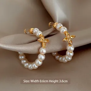 Elegant gold-plated C-shape pearl hoop earrings with gold floral charms, 3.6cm height