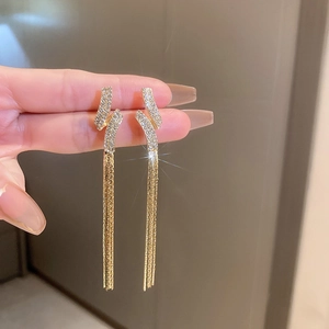 Elegant long tassel earrings with sparkling zircons and delicate golden chain fringe
