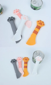 Detail showing colorful silicone cat claw pet food spoons with curved multi-functional edges