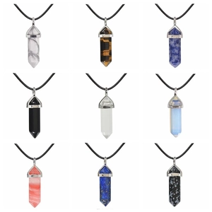 Set of hexagonal natural crystal point pendants on black cords in various stones