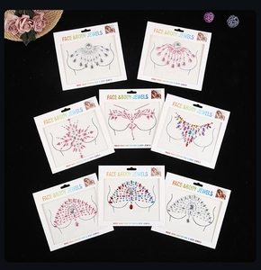 Detailed view of assorted acrylic rhinestone body jewels and face gems in retail packaging