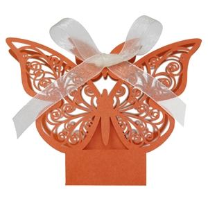 Detailed laser-cut hollow butterfly candy box in vibrant orange with white ribbon