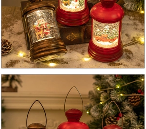 Detail of Christmas lantern snow globe with Santa and reindeer on warm festive background