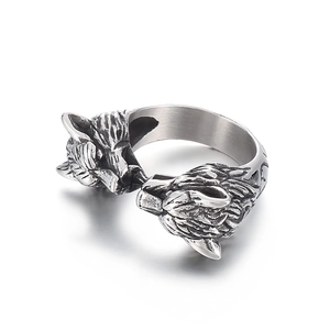 Vintage stainless steel open ring featuring a dual wolf head design in antique silver finish