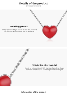 Detail of 925 sterling silver heart necklace with red pendant and polished finish