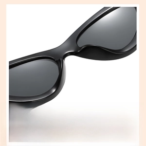 Détail des plaquettes de nez intégrées sur lunettes de soleil œil de chat noires