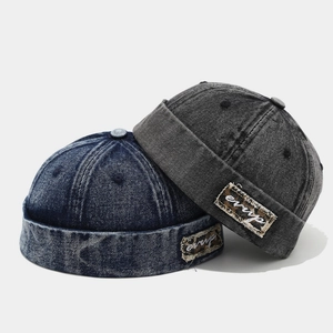 Vintage denim Miki hats in dark blue and black washes with unique stitched side patches