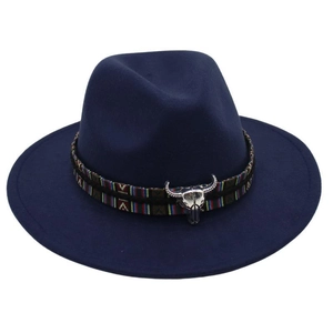 Close-up of navy blue wool fedora featuring ethnic band and silver bull head ornament
