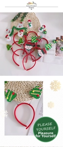 Detailed view of Christmas headbands featuring Santa, snowman, and tree decorations
