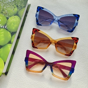 Elegant cat-eye blue light blocking glasses with butterfly frames in assorted leopard patterns