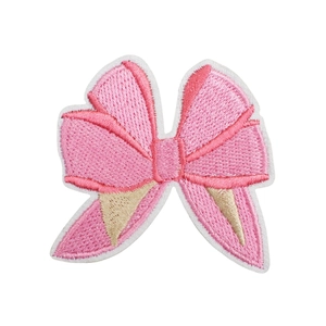 Pink embroidered bow patch with champagne gold lines and white stitched border on white back