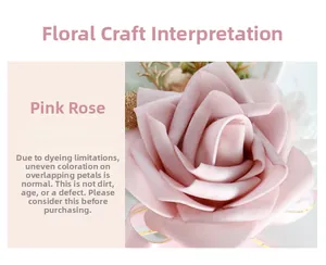 Detail view of dusty pink PE rose boutonniere with golden leaves and velvet texture