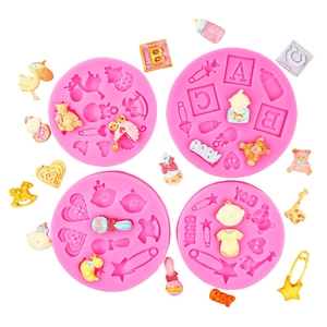 Detailed pink silicone molds with baby patterns for fondant and chocolate decoration