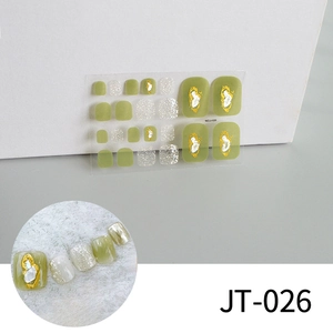 Detail of avocado green and silver glitter 3D toe nail stickers with gold foil accents