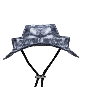 Top view of pet sun hat in washed denim fabric with ear holes and adjustable drawstring